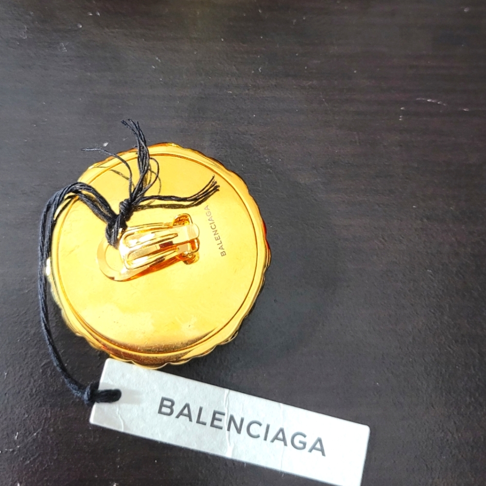 Balenciaga statement earings.  one piece
